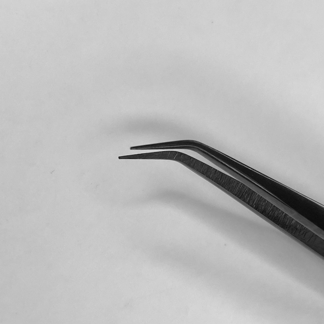 Angled Tip Isolation Tweezer